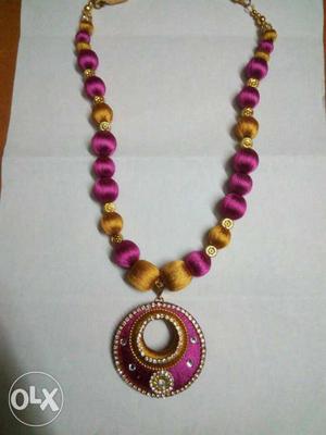 Silk thread worked necklace worth 500 is available for