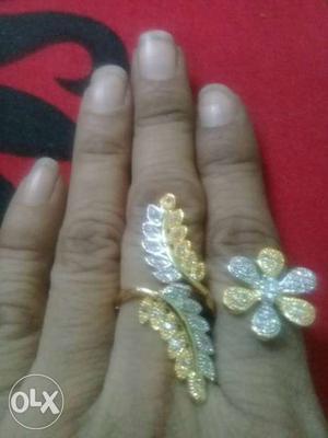 Two Silver And Gold Rings 150 each