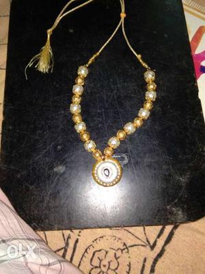 White And Gold Necklace