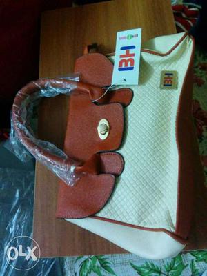 White and brown smart bag