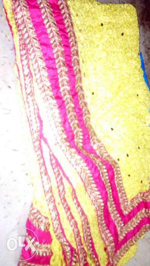 Yellow And Pink Floral Textile