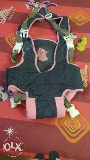Baby's Black And Pink Carrier