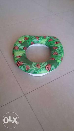 Baby's Green, Red And White Potty Trainer Cover