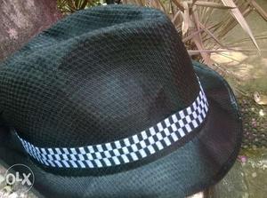 Black hat with b&w check boder not used