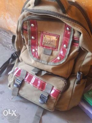 Brown And Red Backpack