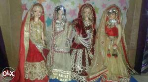Four Barbie Wearing Traditional Dress