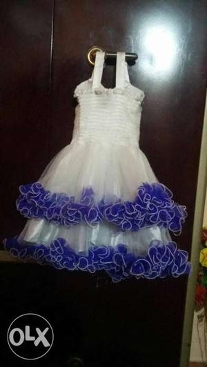 Girl's White And Purple Dress