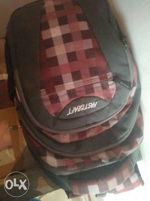 Gray, Red, And Black Fastcraft Backpack
