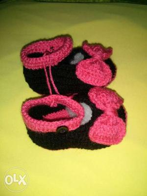 Handmade crochet baby shoe.