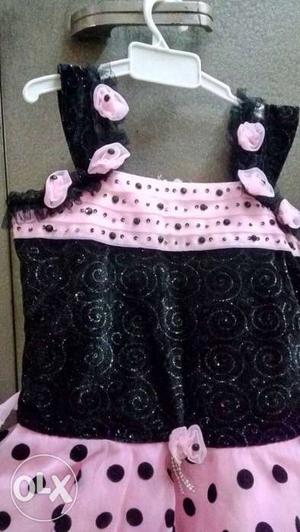 Party wear pink frock with black polka dots unused