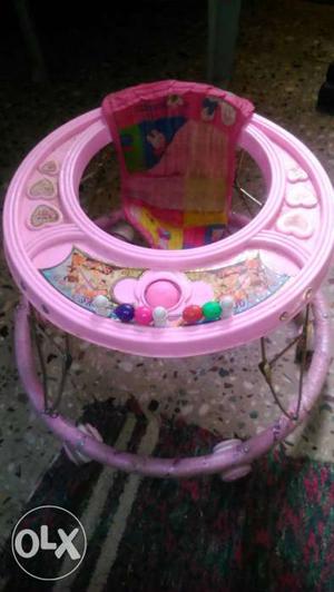 Pink baby walker with vry good condition