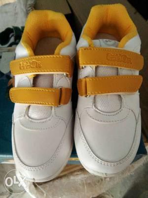 White-and-yellow Velcro Strap Shoes