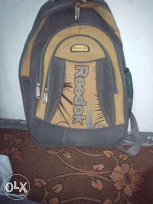 Yellow And Gray Reebok Backpack