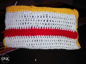 Yellow, Red, And White Knit Mesh Textile