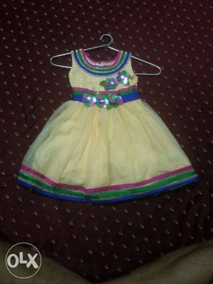 Yellow colour baby party wear frok