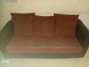A three seater and two single seater sofa about