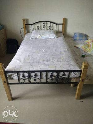 Black And Brown Metal And Wooden Bed Frame With Mattress