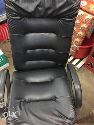 Black Padded Rolling Armchair