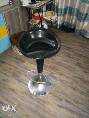 Black coloured bar stool in good condition at a reasonable
