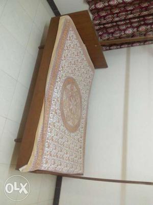 Brown And White Bed Sheet