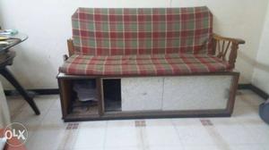 Brown Wooden And Red Fabric Sofa with sliding compartment