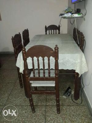 Brown Wooden Table With Chair Set And White Table Cove