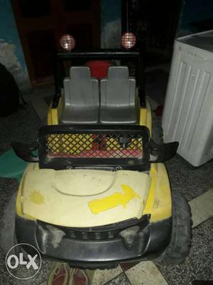 Children's Yellow And Black Ride On Toy Car