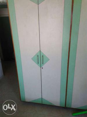 Green And White Wooden Cabinet