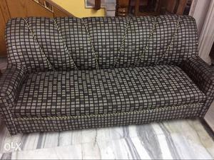 Grey And Black Checkered Sofa. 5 sitter I CAN NEGOTIATE