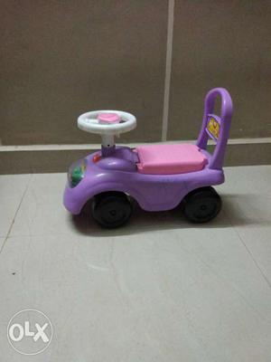 Purple And Pink Ride On Toy Car