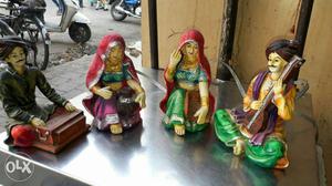 Tow Woman And Two Man Ceramic Figurines