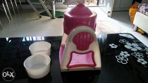 White And Pink Plastic Chair