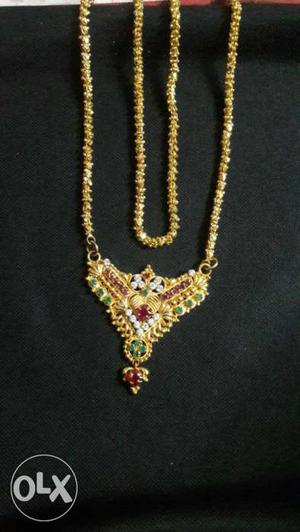 1 gm gold long chain with dollar