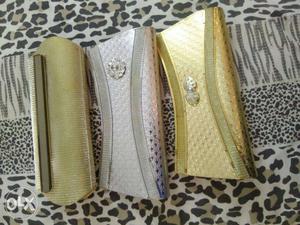 3 brand new clutches in golden and silver colour.