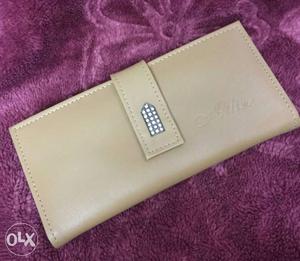 Beautiful and elegant wallet in light brown