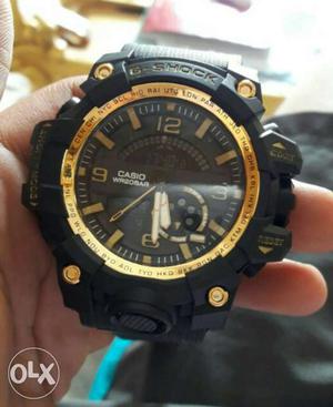 Black And Gold G-shock Chronograph Watch