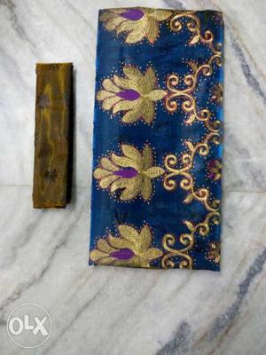 Blue, Purple, And Brown Floral Textile
