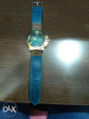 Blue Strap Gold Case Round Chronograph Watch