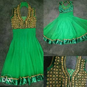 Bottle green color suit with heavy golden stone