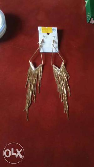 Brand new earrings, golden color. with tag