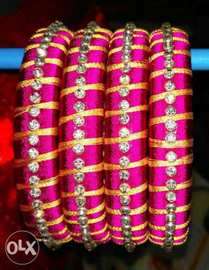 Four Pink And Yellow Thread Bangles