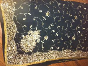 Georgette sari with golden antique embroidery