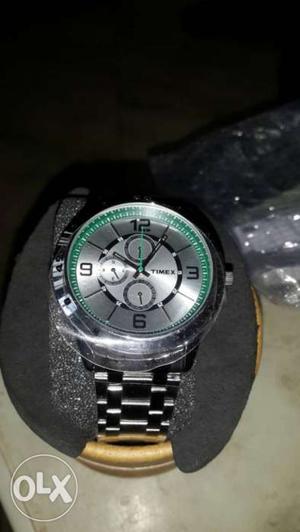 Gray And Green Timex Chronograph Watch With Silver Link
