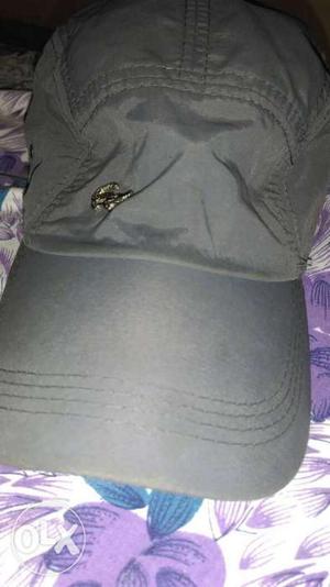 Lacoste Grey cap. Brand New ORIGINAL.Never used