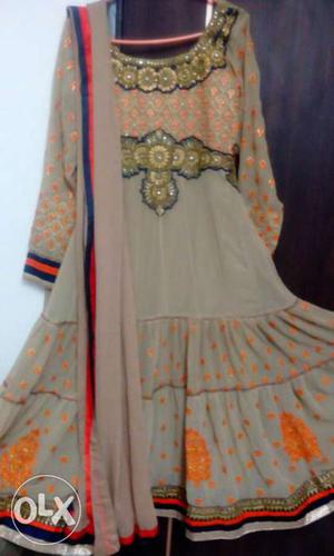 Long anarkali with embroidery work.