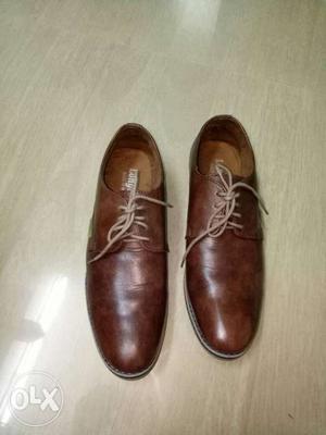 Longlite Shoes.brown coloured.2 days old.not even