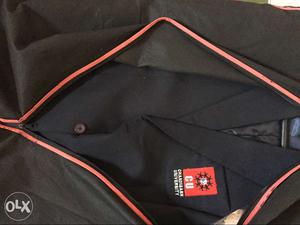 Navy blue coat with CU logo new condition M Size with tie