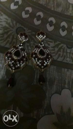 New red diamond earrings.