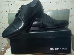 Pair Of Black Leather Duchini Dress Shoes With Box