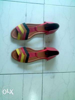 Pair Of Brown Pink Black And Yellow Sandals